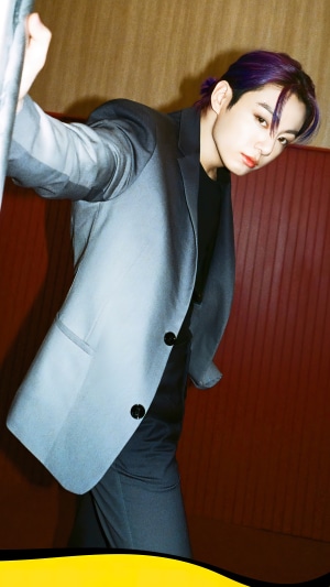 Jungkook from BTS wearing a suit