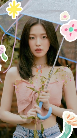 Arin from Oh My Girl holding an umbrella