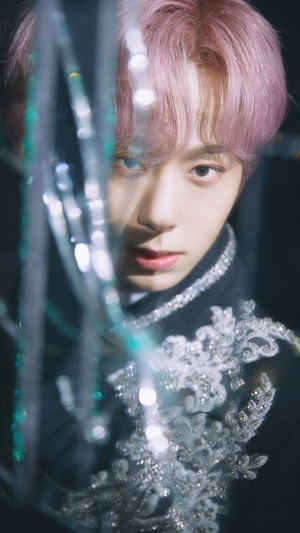 Hwanwoong from ONEUS with pink hair