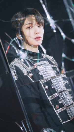 Seoho from ONEUS in a jeweled military-style jacket