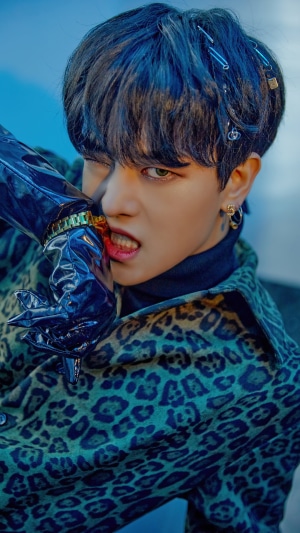 Ravn from ONEUS biting his glove