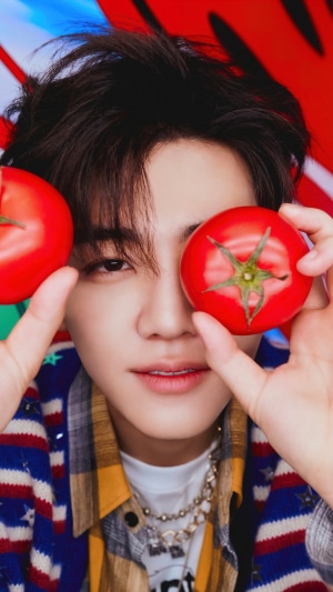 Jaemin from NCT Dream with tomatoes