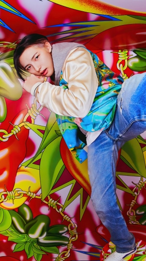 Renjun from NCT Dream in colorful jacket