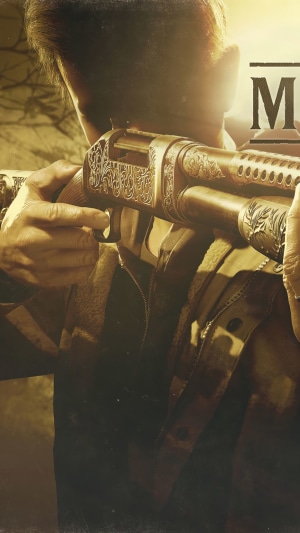 Man holding a decorated shotgun in Resident Evil Village