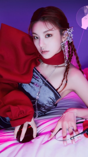 Yeji from ITZY with red scarf and jewelry