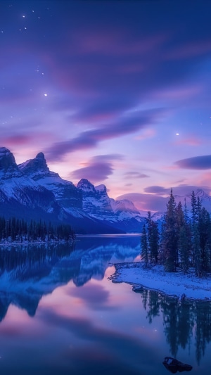 Mountain lake at sunrise with stars and purple sky