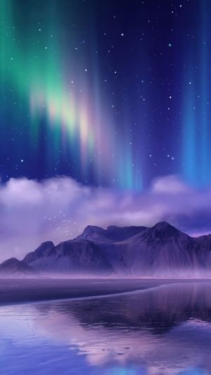 Aurora Borealis Over Mountain Landscape
