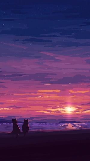 Two cats watching a sunset on a beach