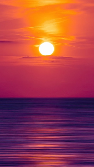 Sunset over the ocean with vibrant colors