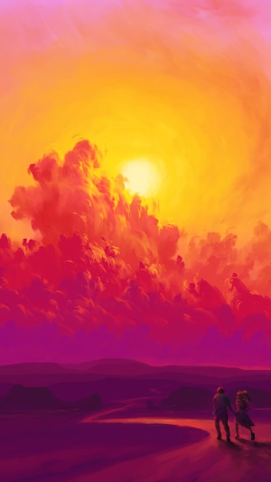 Couple walking through a colorful landscape at sunset