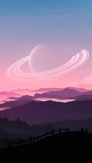 Saturn over misty mountains at sunset