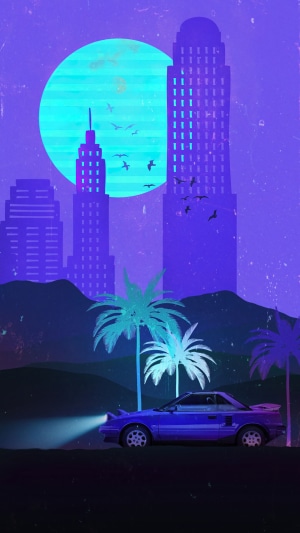 Retro car driving at night in a city with palm trees