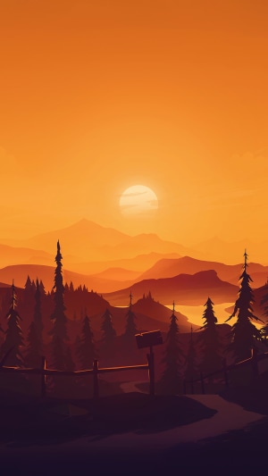 Sunset over mountains and forest with a lake