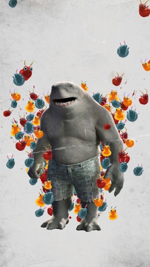 King Shark from The Suicide Squad surrounded by creatures