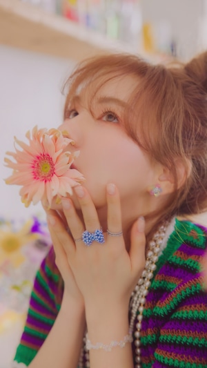 Wendy from Red Velvet with a flower