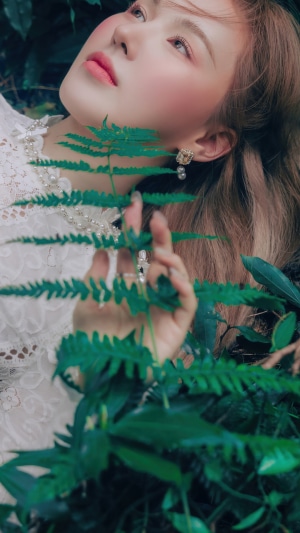 Wendy from Red Velvet in a forest setting