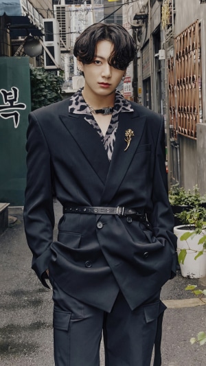 Jungkook from BTS in a dark suit
