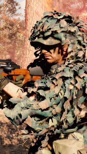 Soldier in ghillie suit holding a rifle in Call of Duty