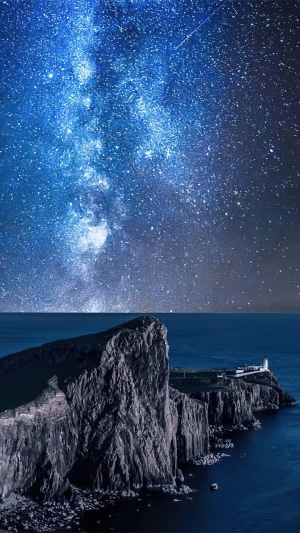 Milky Way over a Lighthouse on a Cliff