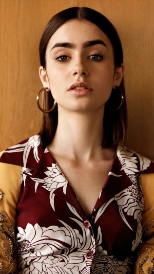 Lily Collins in a floral print shirt