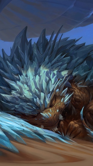 Dragon covered in ice sleeping on sand