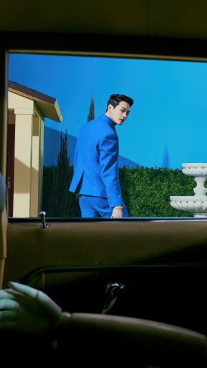Minho from Shinee in a blue suit