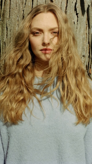 Amanda Seyfried in a light blue sweater