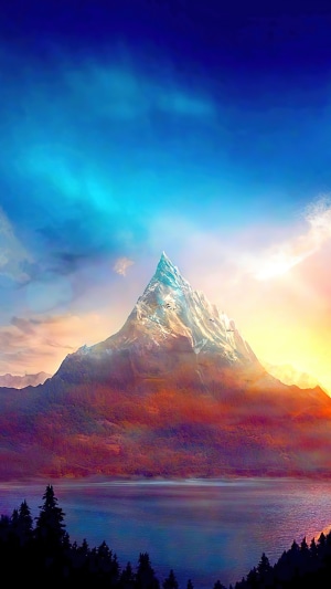 Majestic mountain peak at sunset over a lake