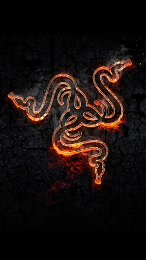 Razer logo on a dark, cracked background with fire