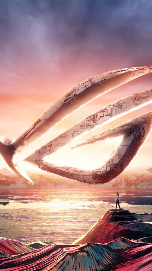 Asus ROG Logo over a landscape at sunrise