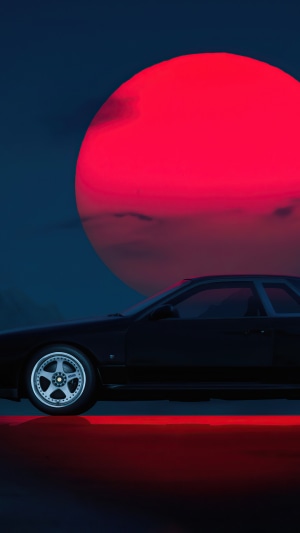 Black Sports Car Under a Red Moon