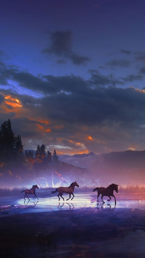 Three horses running across a misty landscape at sunset