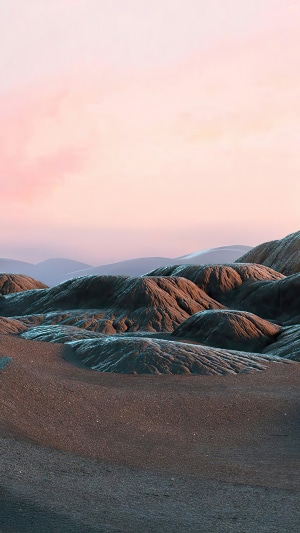 Surreal alien landscape with pink sky