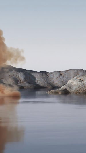 Rocky landscape with water and smoke