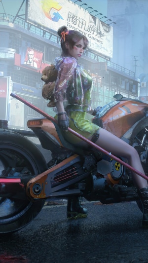 Girl with teddy bear on a motorcycle in a city
