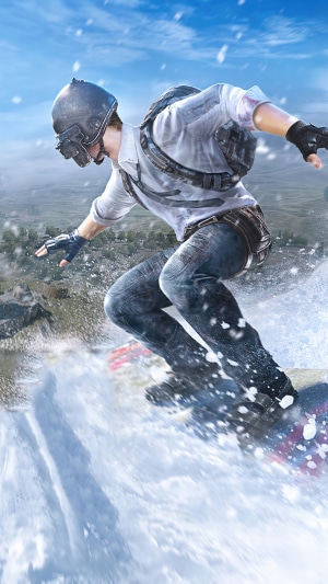 Player in PUBG Mobile snowboarding down a snowy mountain
