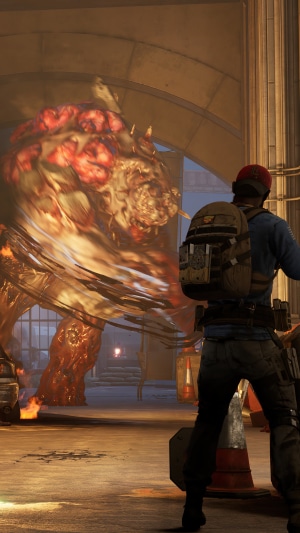 Back 4 Blood: A large monster attacks a player character