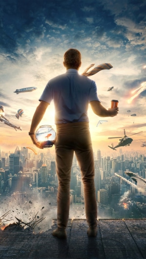 Guy from Free Guy holding a fishbowl