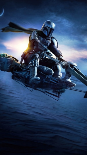 The Mandalorian and Grogu on a Speeder Bike from Star Wars