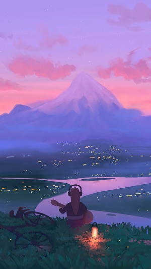 Person playing guitar with headphones overlooking city and mountain at sunset