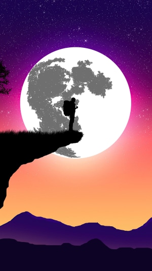 Silhouette of a backpacker on a cliff overlooking the moon