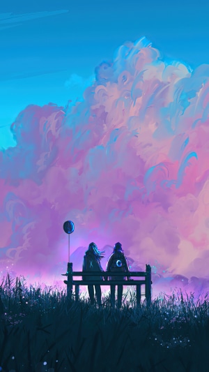 Couple sitting on a bench with a balloon
