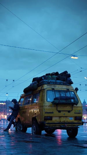Yellow camper van loaded with luggage at night