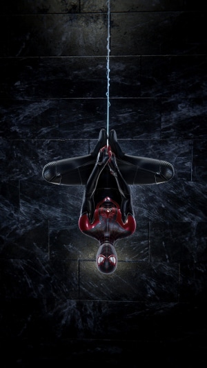 Miles Morales from Marvel's Spider-Man hanging upside down