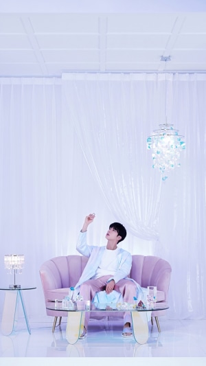 Jin from BTS in a science-themed photoshoot