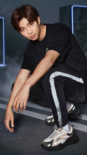 RM from BTS wearing Fila clothing