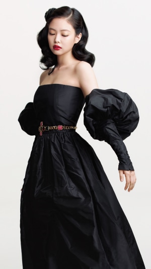 Jennie from BLACKPINK in a black dress photoshoot