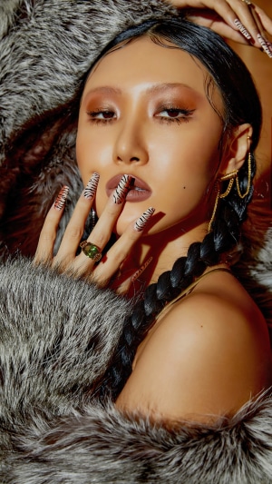 Hwasa from MAMAMOO with tiger-striped nails