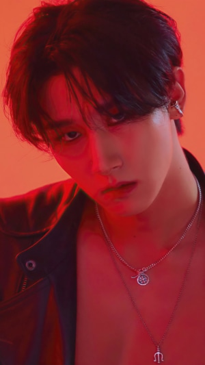 I.M from Monsta X with red lighting