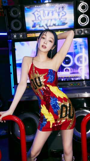 Lea from Secret Number in a sequined dress